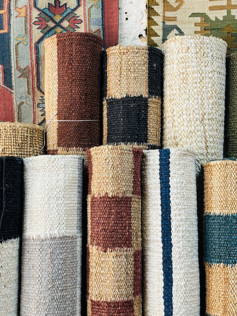 sustainable gift idea, botanical themed rug, floral entry mat, nature-inspired rug, all-season jute rug, hand knotted floral jute, rustic natural beauty rug, elegant jute décor, warm jute texture rug, thoughtful earth tone rug, and organic home piece.