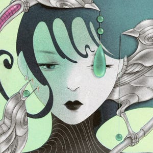 May include: Illustration of a woman with black hair and a pale complexion, adorned with stylized silver bird-like figures. The artwork features a teal and green color palette with a teardrop-shaped gem and black lipstick.