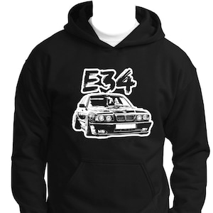 May include: Black hoodie with a white graphic of a BMW E34 car and the text "E34" above it.