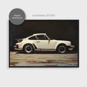 May include: A white Porsche 911 Turbo with black accents parked in a garage. The car is facing the right side of the image. The car is in a garage with a dark background.
