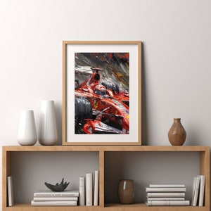 K&ouml;nnte beinhalten: Ein gerahmtes Gem&auml;lde eines roten Rennwagens, der durch einen verschwommenen Hintergrund rast. Das Auto ist in einem lockeren, impressionistischen Stil mit sichtbaren Pinselstrichen gemalt.