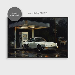 May include: A white Porsche 911 sports car parked at a petrol station under a canopy. The car is wet from the rain and the petrol station lights are on. The car has a black bumper and black wheels.