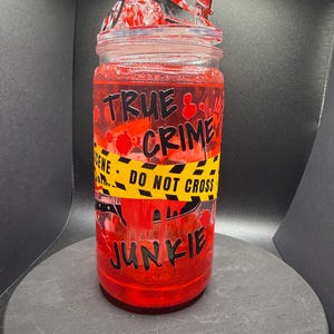 true crime junkie lava drip tumbler with faux ice lid