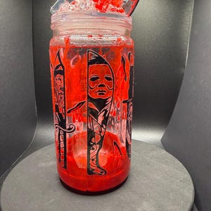 horror movie 16 ounce lava drip snowglobe tumbler with faux ice lid