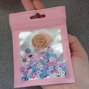 Stitch inspired bead confetti, bead soup, stitch colour theme, bracelet making, lilo and stitch theme, purple and blue beads, clay bead soup image 13