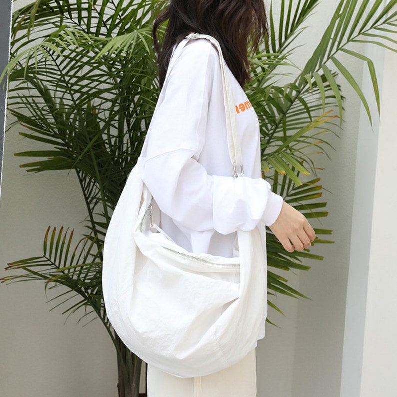 Fashion Solid Color Dumpling Bag Freizeit Canvas Single-Shoulder Bag für den täglichen Gebrauch Langlebige und stilvolle Tasche für Männer und Frauen White