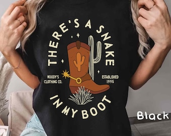 Disney Toy Story Woody Cowboy Shirt, There’s A Snake In My Boot Tee, Vintage Western Graphic, Disneyland  Family Matching Trip Shirt 2025