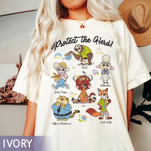 Camiseta de los personajes de Zootopia de Disney: Protege a la manada, Judy Hopps, Nick Wilde y Priscilla. Viaje familiar a juego en Disneyland.