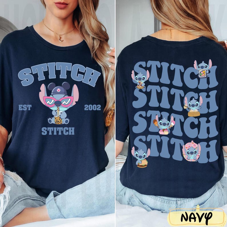 May include: Navy blue t-shirt featuring a cartoon Stitch character wearing sunglasses and holding a drink, with the word "STITCH" above and below the character. The back of the shirt has multiple Stitch graphics and the word "STITCH".