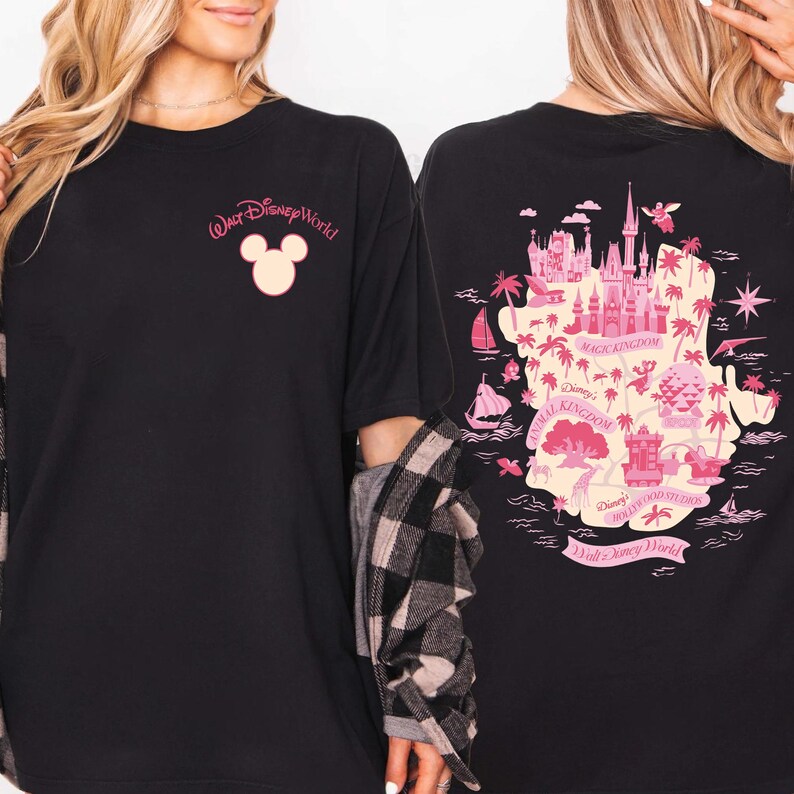 May include: Black t-shirt featuring a pink Walt Disney World logo with a Mickey Mouse head on the front. The back of the shirt displays a pink map of the Disney World theme parks, including Magic Kingdom and Animal Kingdom. The shirt is a comfortable, casual style.