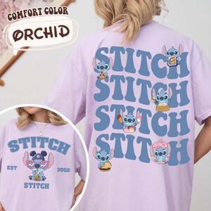 May include: Orchid-colored t-shirts featuring the word "Stitch" in blue, with Stitch character graphics. One shirt has a front graphic with Stitch wearing sunglasses. The shirts are Comfort Color brand.