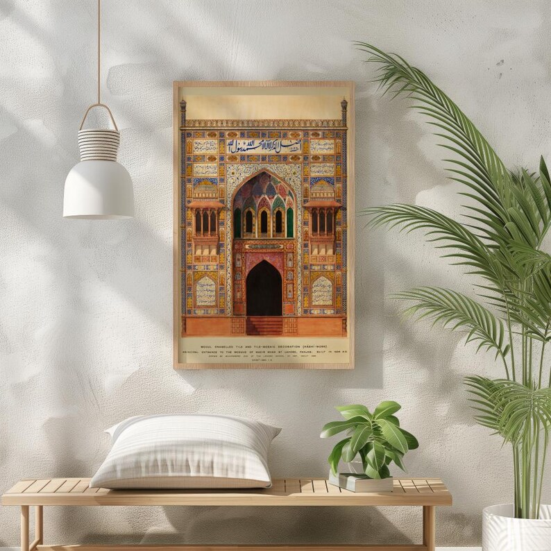 May include: A vintage illustration of a colorful, ornate building with intricate details and Arabic script. The building has a large arched entrance and multiple windows. The illustration is framed in a wooden frame.