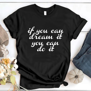 May include: Black t-shirt with white text that reads "if you can dream it you can do it".
