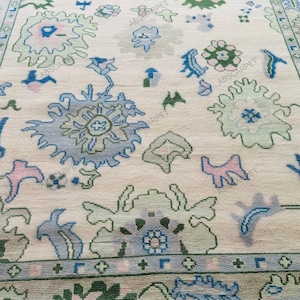 Hand-Knotted Oushak Wool Rug 9x12: Blue & White Turkish Design for living Room.