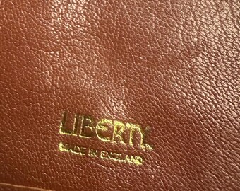 Vintage Liberty Brown Leather with Liberty Silk Print Fabric. One Main Compartment and 4 Components for notes. A Rare Find Beautiful.