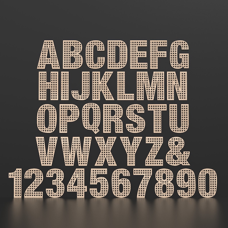 The full Alphabet of wooden letters with each letter having a rattan pattern cut out of the middle of it.