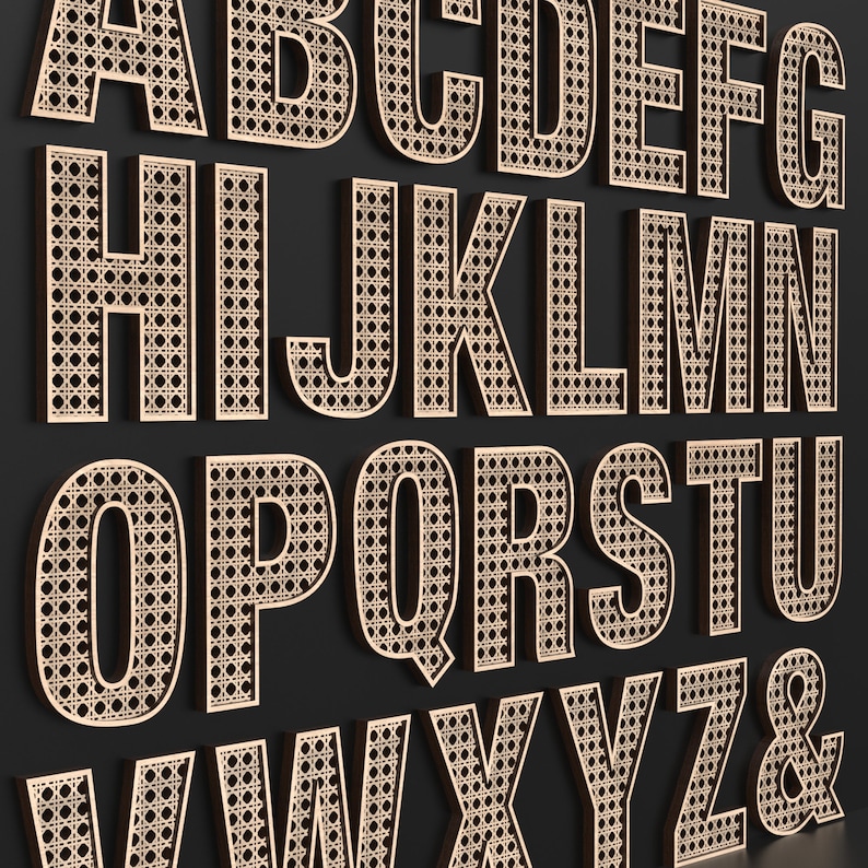 The full Alphabet of wooden letters with each letter having a rattan pattern cut out of the middle of it.