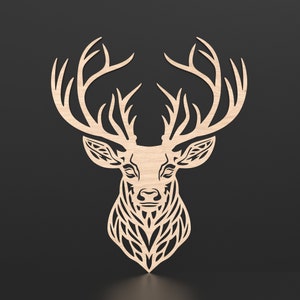 An intricate cut geometric stag head wall plaque cut out of wood placed on a wall.