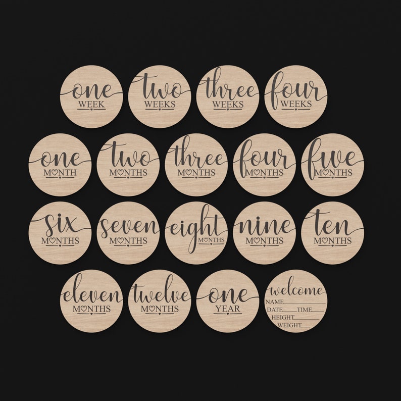 18 Baby Milestone Discs made from our Svg Laser Cutting Files Digital Download.