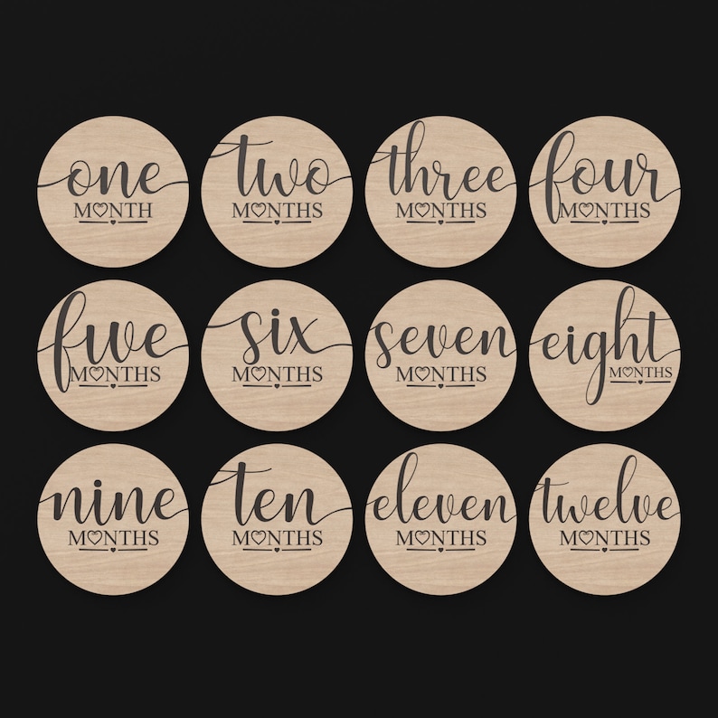 12 Month Baby Milestone Discs made from our Svg Laser Cutting Files Digital Download.