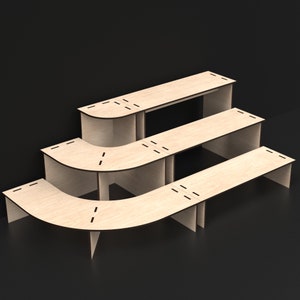 3 Tier Laser Cut Modular Display Stands made from our Svg Laser Cutting Files Digital Download.
A single corner unit and a straight unit connected together.