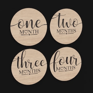 4 Months Baby Monthly Milestone Discs made from our Svg Laser Cutting Files Digital Download.