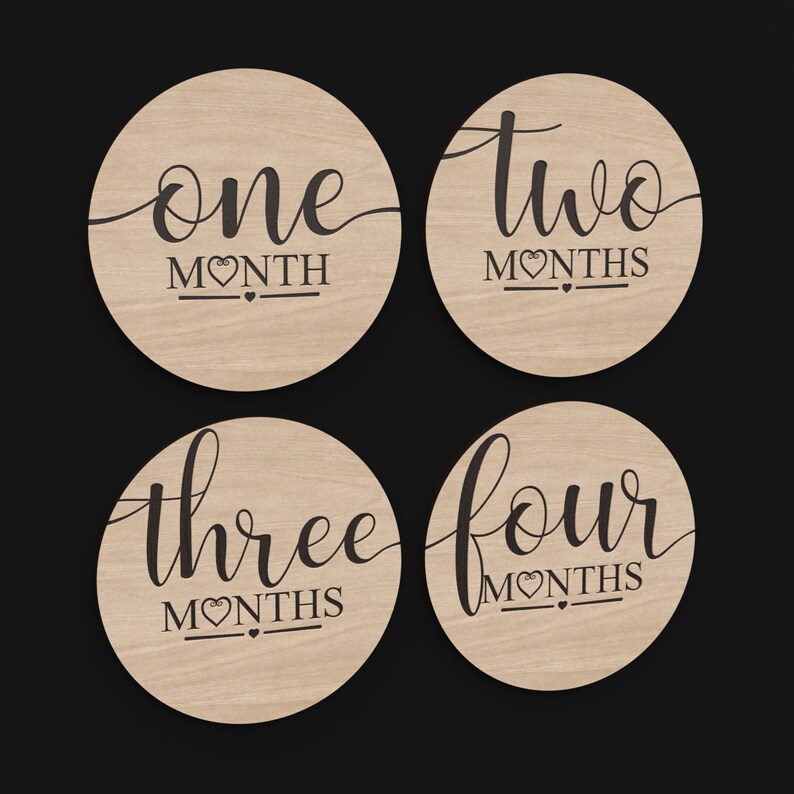 4 Months Baby Monthly Milestone Discs made from our Svg Laser Cutting Files Digital Download.