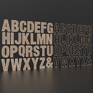 The full Alphabet of wooden letters with each letter having a rattan pattern cut out of the middle of it and a raised outline of each letter to be cut and placed on top creating a 3d look effect.