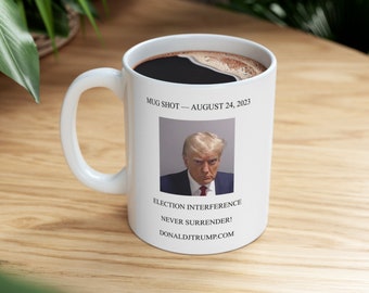 Donald Trump Mug Shot Coffee Cup, Never Surrender, Election interference
