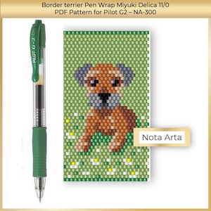 May include: A green Pilot G-2 05 pen beside a beaded pattern of a Border Terrier dog. The dog is brown and grey, set against a green background with white and yellow flower accents. The text "Nota Arta" is also visible.
