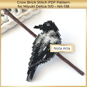 May include: A beaded crow figure created with brick stitch using black and grey Miyuki Delica 11/0 beads, perched on a brown twig. The text Crow Brick Stitch PDF Pattern for Miyuki Delica 11/0 – NA-138 and the brand name Nota Arta are visible.