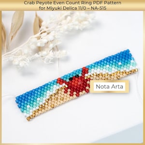May include: A beaded crab design, created using the peyote stitch. The design shows a red crab on a beach scene with blue and white waves. The text "Nota Arta" is visible. The pattern is for Miyuki Delica 11/0 beads.