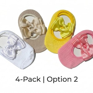 "4-pack | option 2" reads at the bottom. Four ballerina socks on cartons, presented against a white background. Colors include white, beige, yellow, and pink.