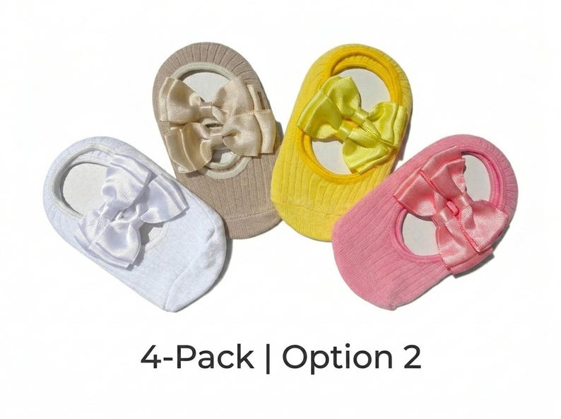 "4-pack | option 2" reads at the bottom. Four ballerina socks on cartons, presented against a white background. Colors include white, beige, yellow, and pink.