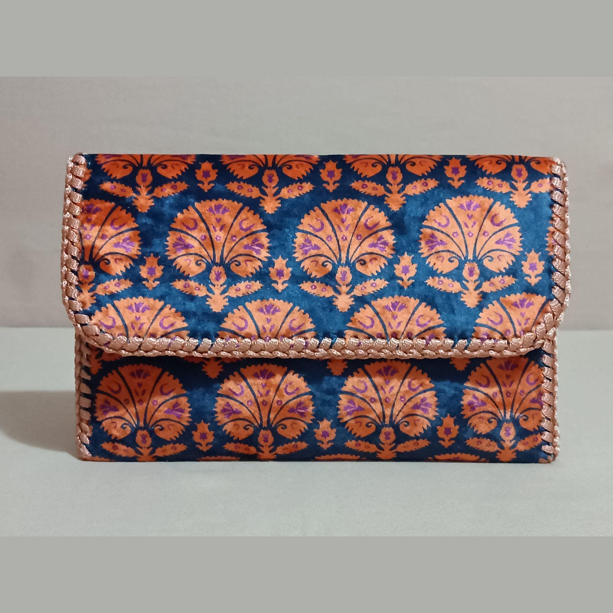 Navy and orange clutch bag discount
