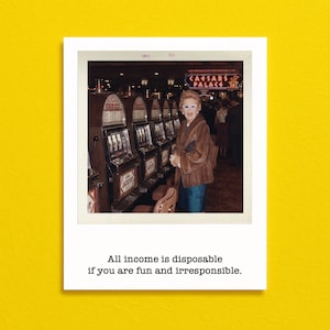 May include: A vintage photograph print featuring a person wearing a brown fur coat and white-rimmed glasses standing in a casino next to slot machines. The text "All income is disposable if you are fun and irresponsible." is printed below the image.