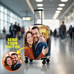 May include: A rolling suitcase with a custom photo print of a smiling couple. The suitcase has a retractable handle and four black wheels. The text "SEND YOUR PHOTOS" is displayed on the side of the suitcase, with a smaller inset photo of the couple.