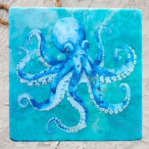 May include: A blue and white octopus with a detailed design on a turquoise background. The octopus has eight tentacles and is depicted in a realistic style.