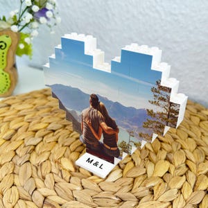 Personalized photo heart made of building blocks. Heart-shaped photo block as a gift for couples for anniversaries, Valentine's Day or weddings.