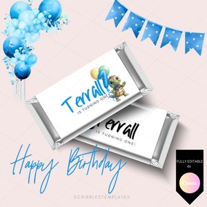 May include: Editable printable chocolate bar wrapper template featuring a blue and green turtle with balloons, the text "Terrall is turning one!" and the words "Happy Birthday" in blue script. The template is designed for a first birthday party.