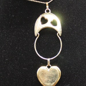 Signed MONET Gold Tone 15&quot; chain with Heart themed pendant.