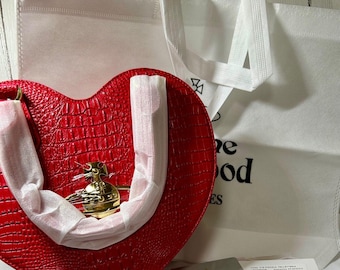 Bolso de hombro bidireccional con estampado de cocodrilo en rojo y negro de Vivienne Westwood