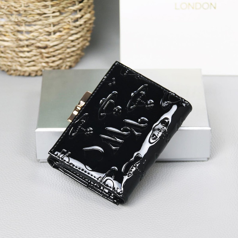 Cartera triple de cuero negro Vivienne Westwood con orbe dorado auténtico imagen 5