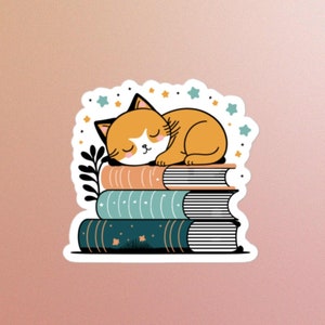 Pegatina de gato durmiendo sobre libros, soñador, estrellas, ratón de biblioteca, gato que duerme en la siesta, compañero de lectura, aficionado a los libros, lindo, adorable, gato acogedor, gatito, naranja, 3 x 3 pulgadas