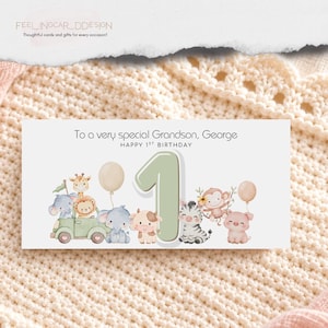 May include: A rectangular birthday card featuring a large sage green number one, watercolor illustrations of a giraffe, lion, elephant, cow, zebra, monkey, and pig, and the text To a very special Grandson, George HAPPY 1ST BIRTHDAY.