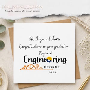 May include: A square white graduation greeting card featuring black text that reads Built your Future Congratulations on your graduation, Engineer! Engineering with a yellow hard hat icon, the name GEORGE, and the year 2026 in black and orange.