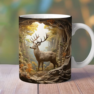 May include: White ceramic mug with a brown and green image of a deer standing in a forest scene. The deer has large antlers and is looking to the left. The forest scene is depicted in a stylized, almost 3D way, with the trees and foliage appearing to be carved out of the mug's surface.