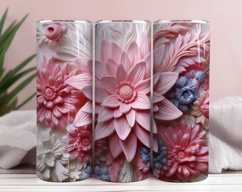 May include: Three stainless steel tumblers featuring a floral design. The tumblers have a pink, white and blue floral pattern with a 3D effect.