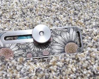 Utility blade laser engraved stainless steel holder. 1 per order.
