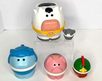 Juego de juguetes preescolares apilables y encajables de animales de granja Little Tikes Vintage: vaca y oveja.